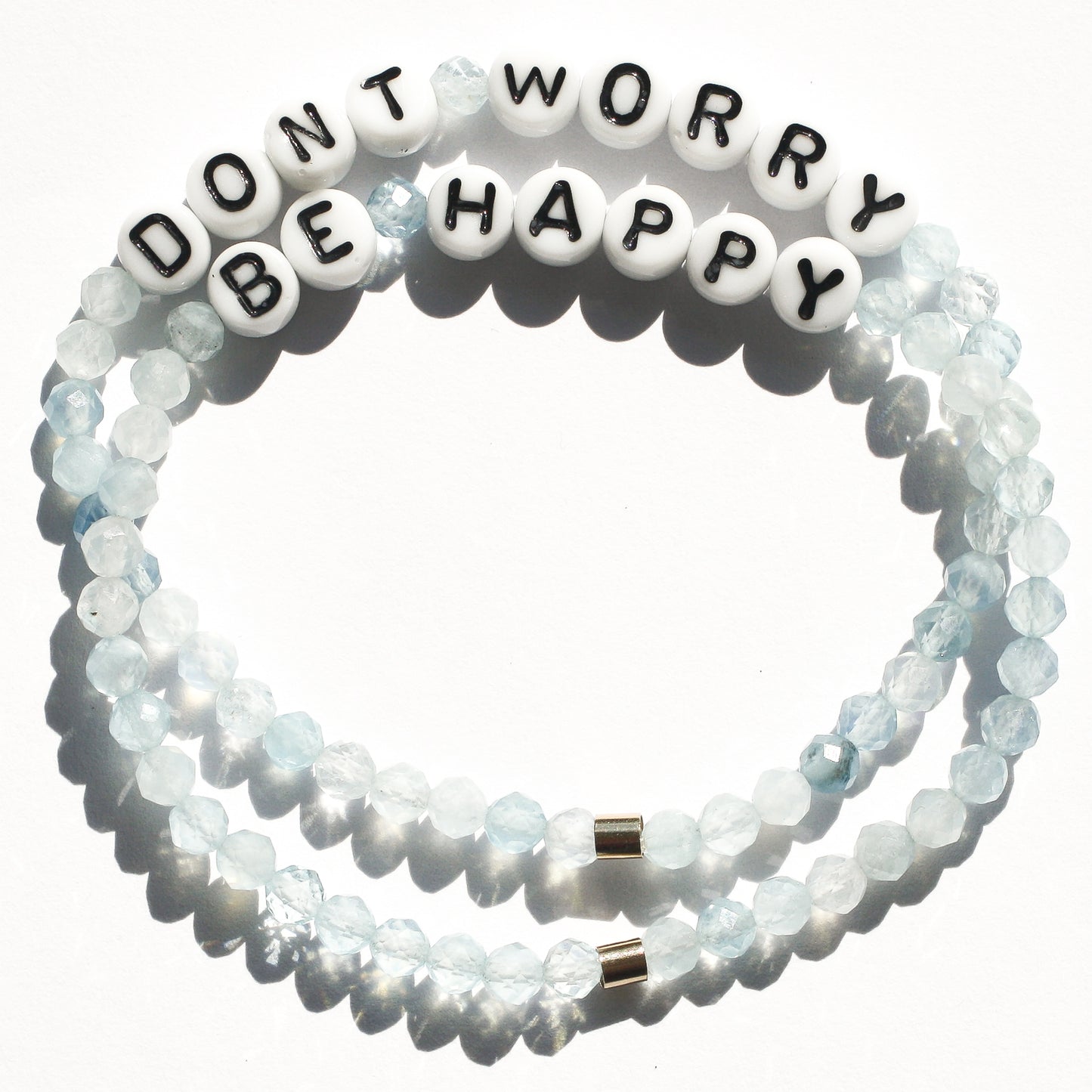 DON'T WORRY BE HAPPY bespoke bracelets in aquamarine