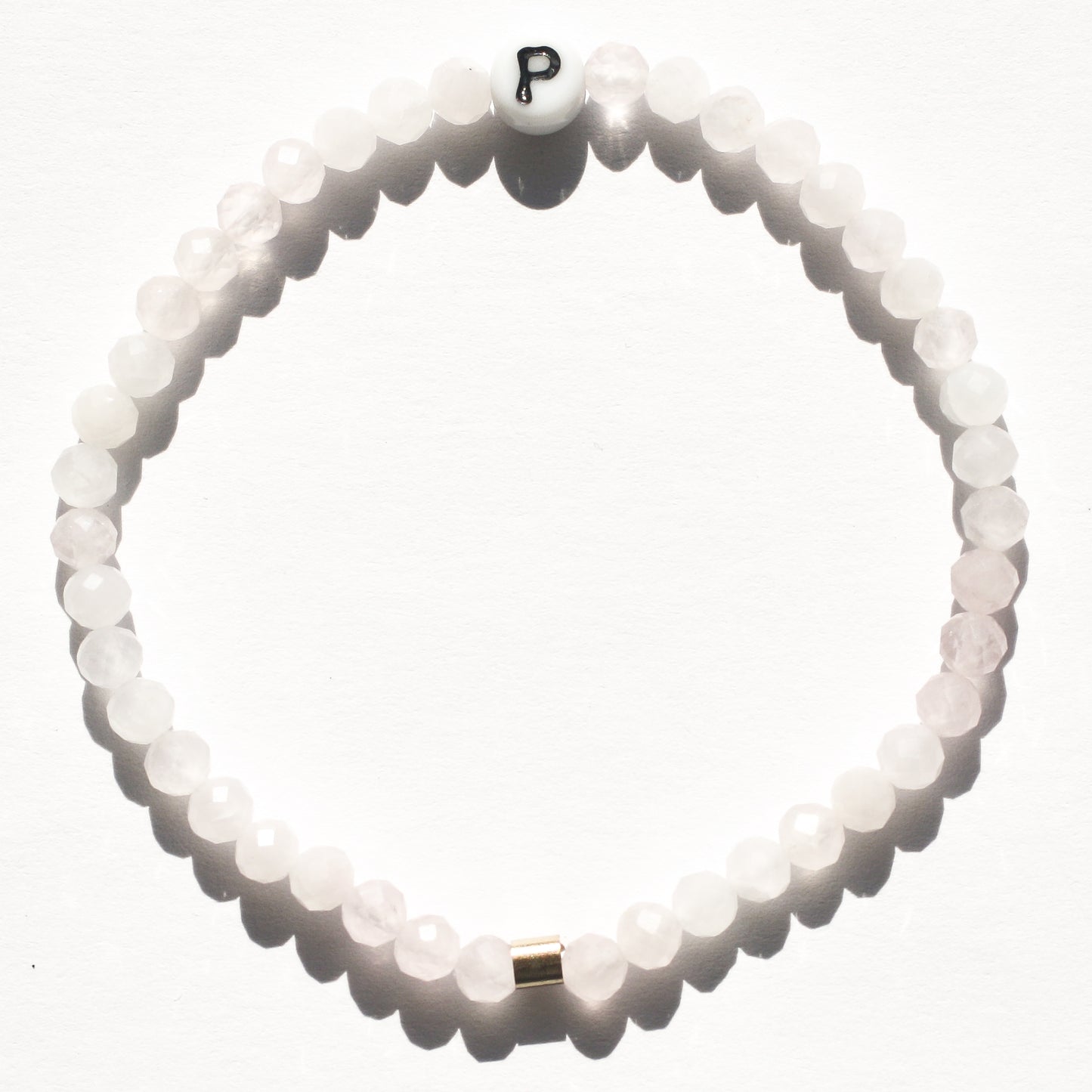 Bespoke P initial bracelet in rose quartz