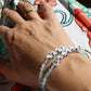 REST and BREATHE bracelets in aquamarine