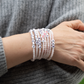 Stack of rose quartz crystal bracelets
