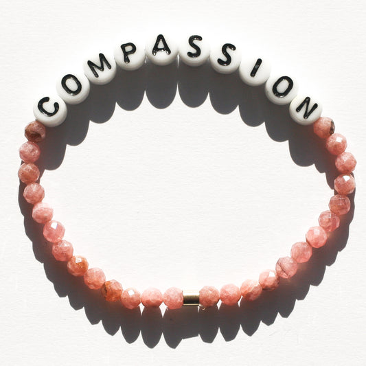 COMPASSION in Rhodochrosite