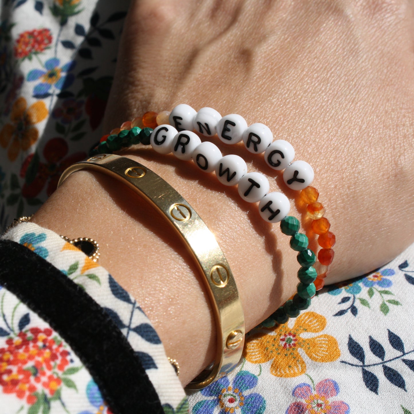 ENERGY and GROWTH bracelets in carnelian and malachite