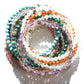 Pile of stone bracelets